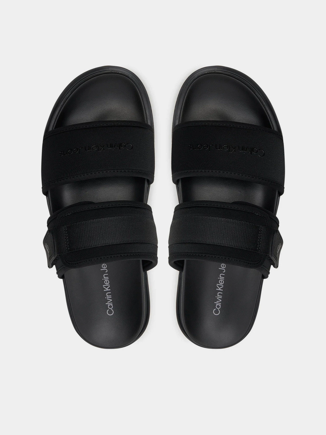 Шльопанці Calvin Klein Double Bar Sandal Wb In Br модель YM0YM00946-0GT Шльопанці Calvin Klein Double Bar Sandal Wb In Br модель YM0YM00946-0GT Фото