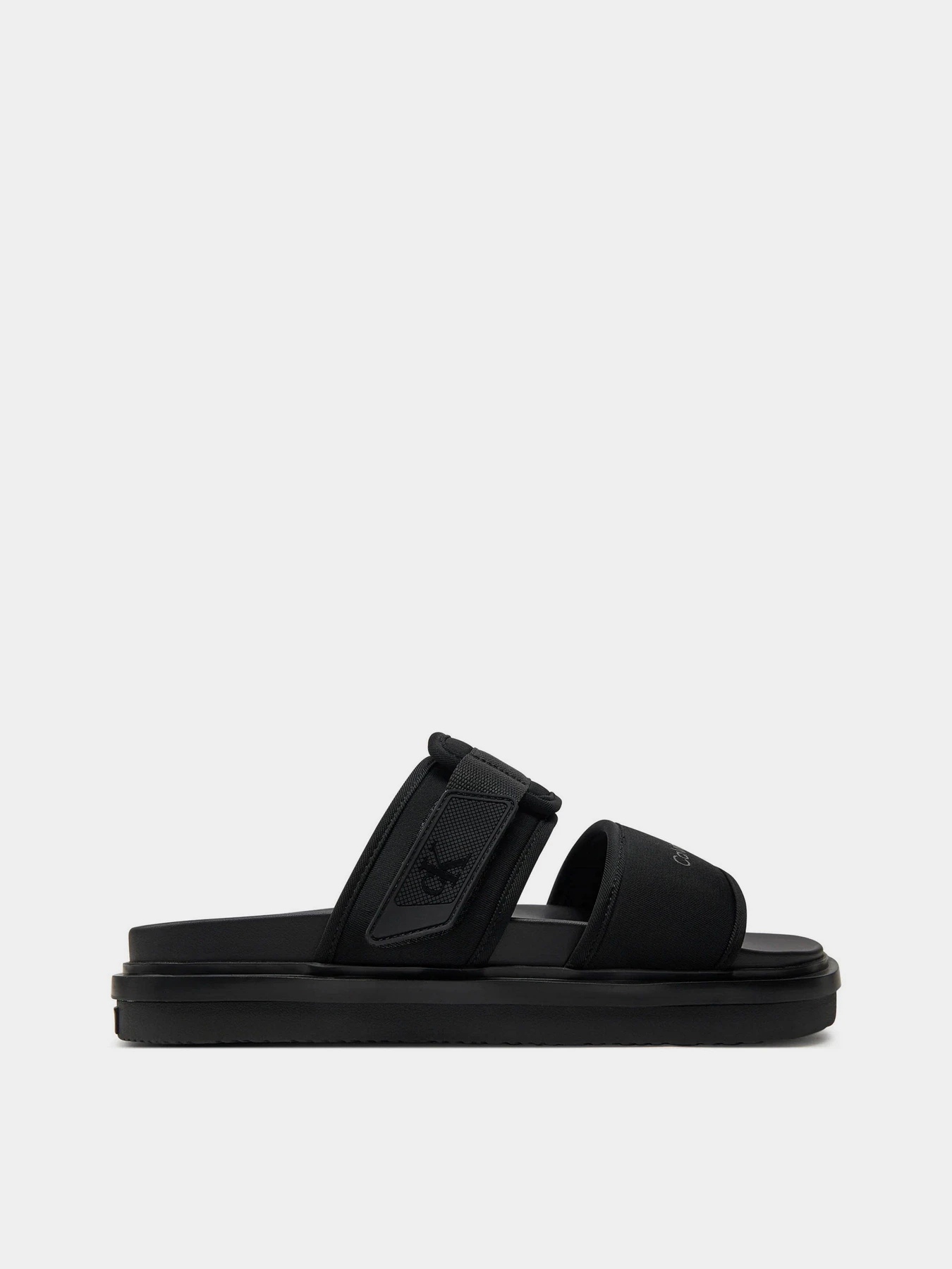 Шльопанці Calvin Klein Double Bar Sandal Wb In Br модель YM0YM00946-0GT Шльопанці Calvin Klein Double Bar Sandal Wb In Br модель YM0YM00946-0GT Фото