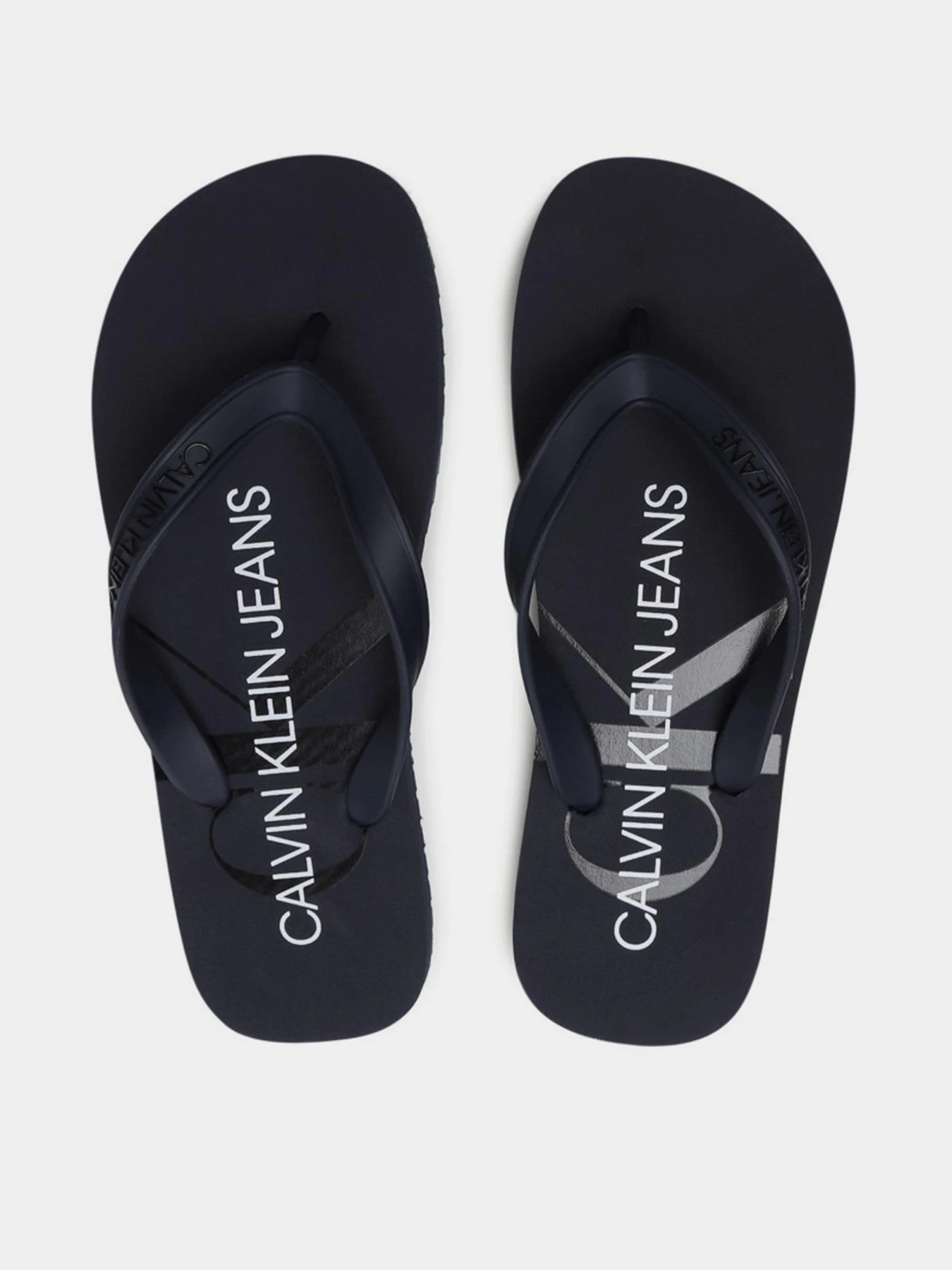 Шльопанці Calvin Klein Beach Sandal Monogram Tpu модель YM0YM00055-CHW Шльопанці Calvin Klein Beach Sandal Monogram Tpu модель YM0YM00055-CHW Фото