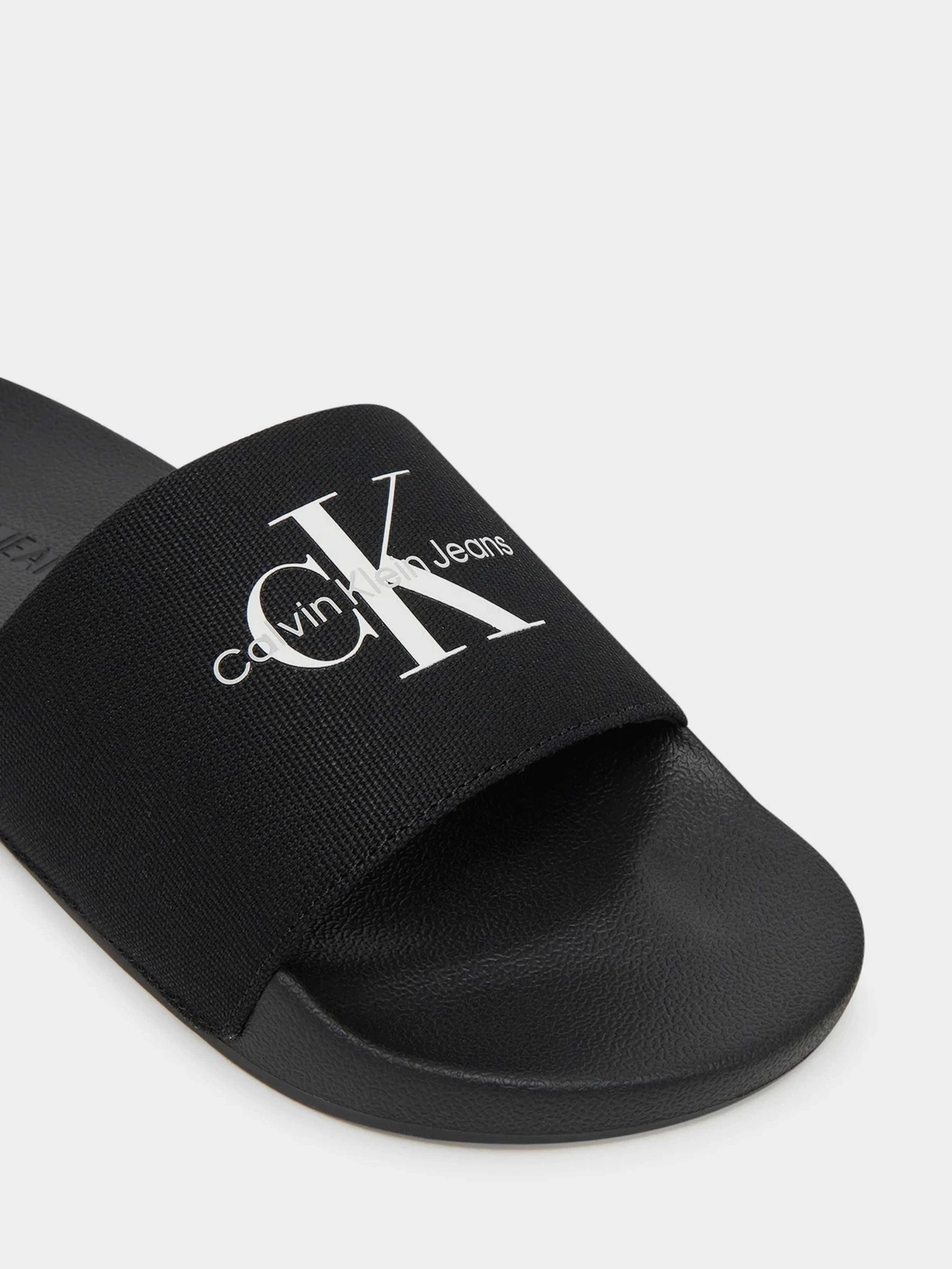 Шльопанці Calvin Klein модель YM0YM01271-0GJ Фото