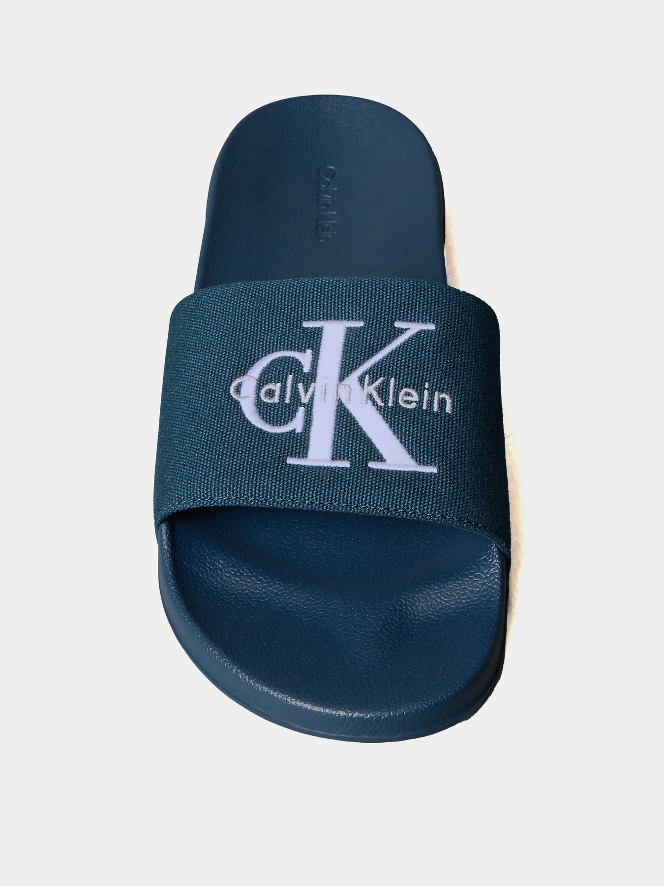 Шлёпанцы Calvin Klein ESS SLIDE CV модель YM0YM01393-BAI Фото