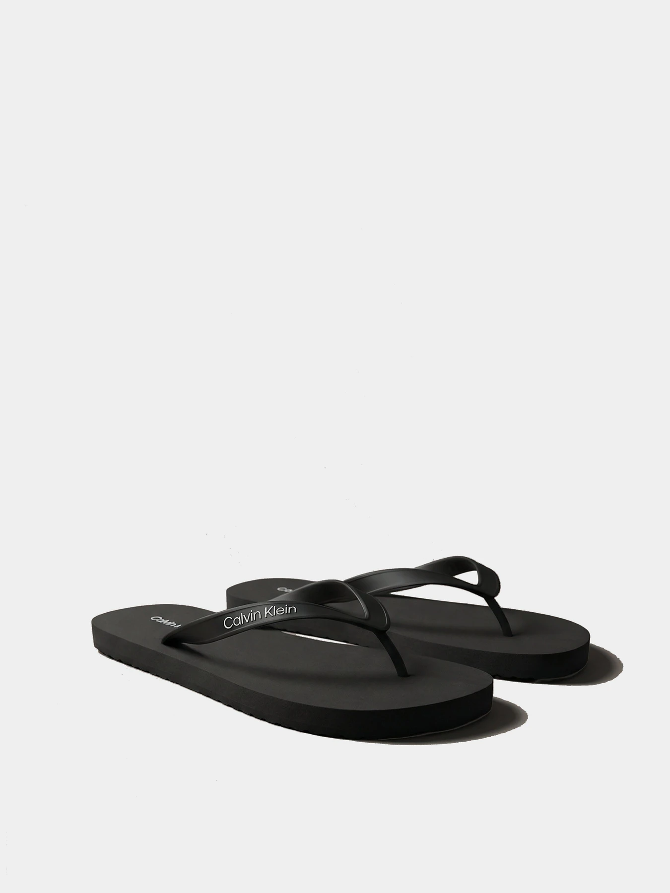 Шльопанці Calvin Klein BEACH THONG SLIDE модель HM0HM02105-0GJ Фото