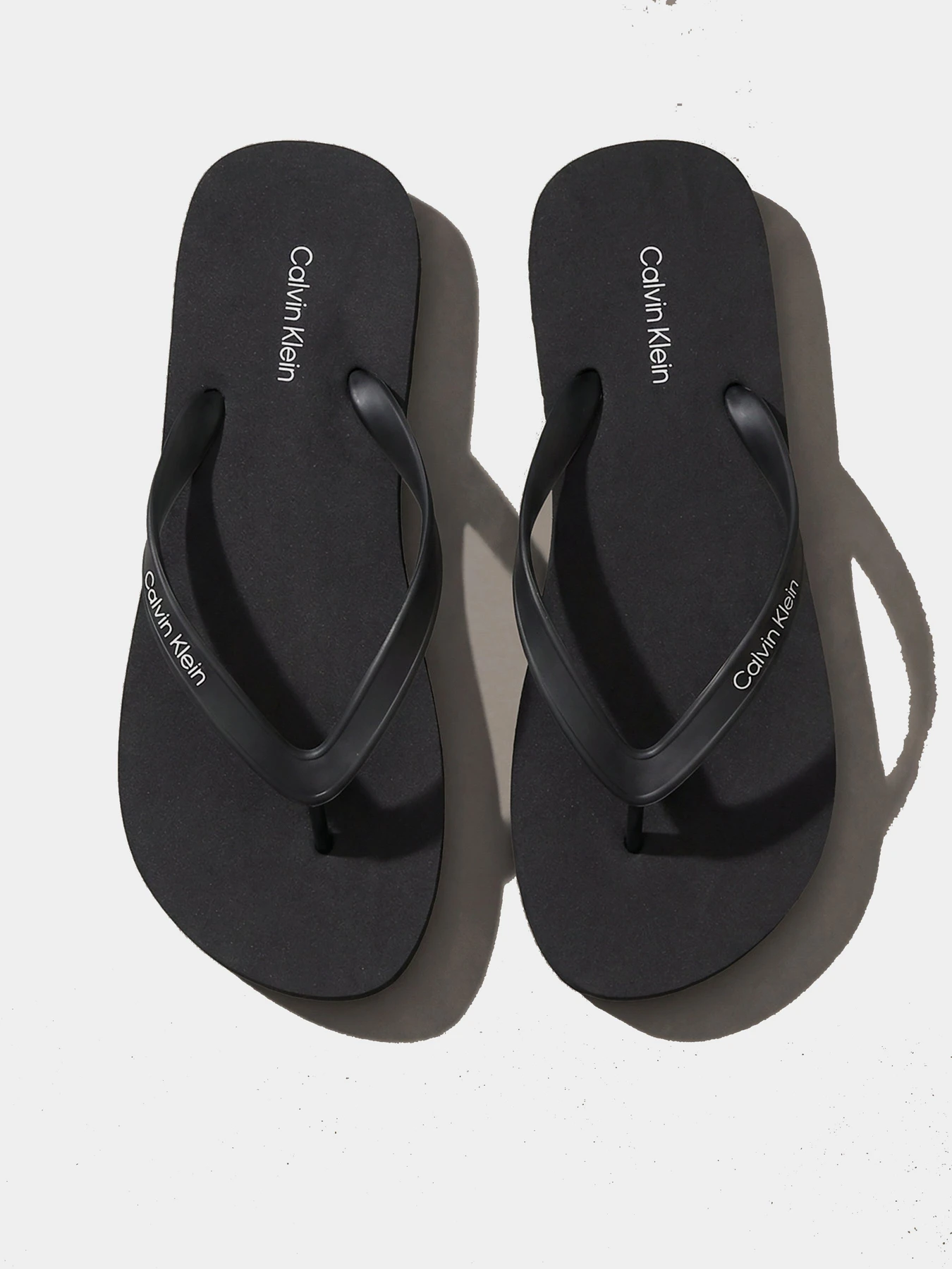 Шльопанці Calvin Klein BEACH THONG SLIDE модель HM0HM02105-0GJ Фото