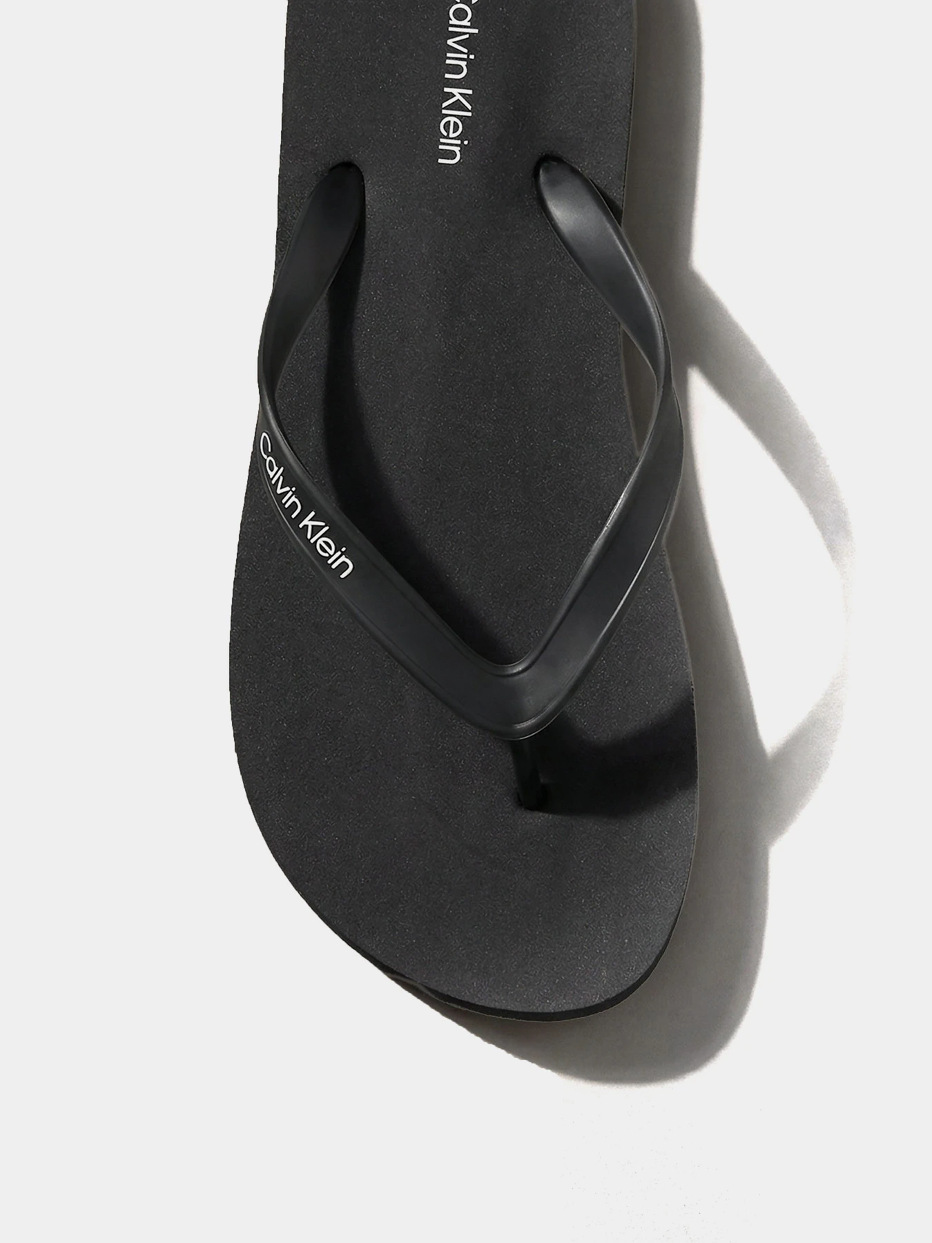 Шльопанці Calvin Klein BEACH THONG SLIDE модель HM0HM02105-0GJ Фото