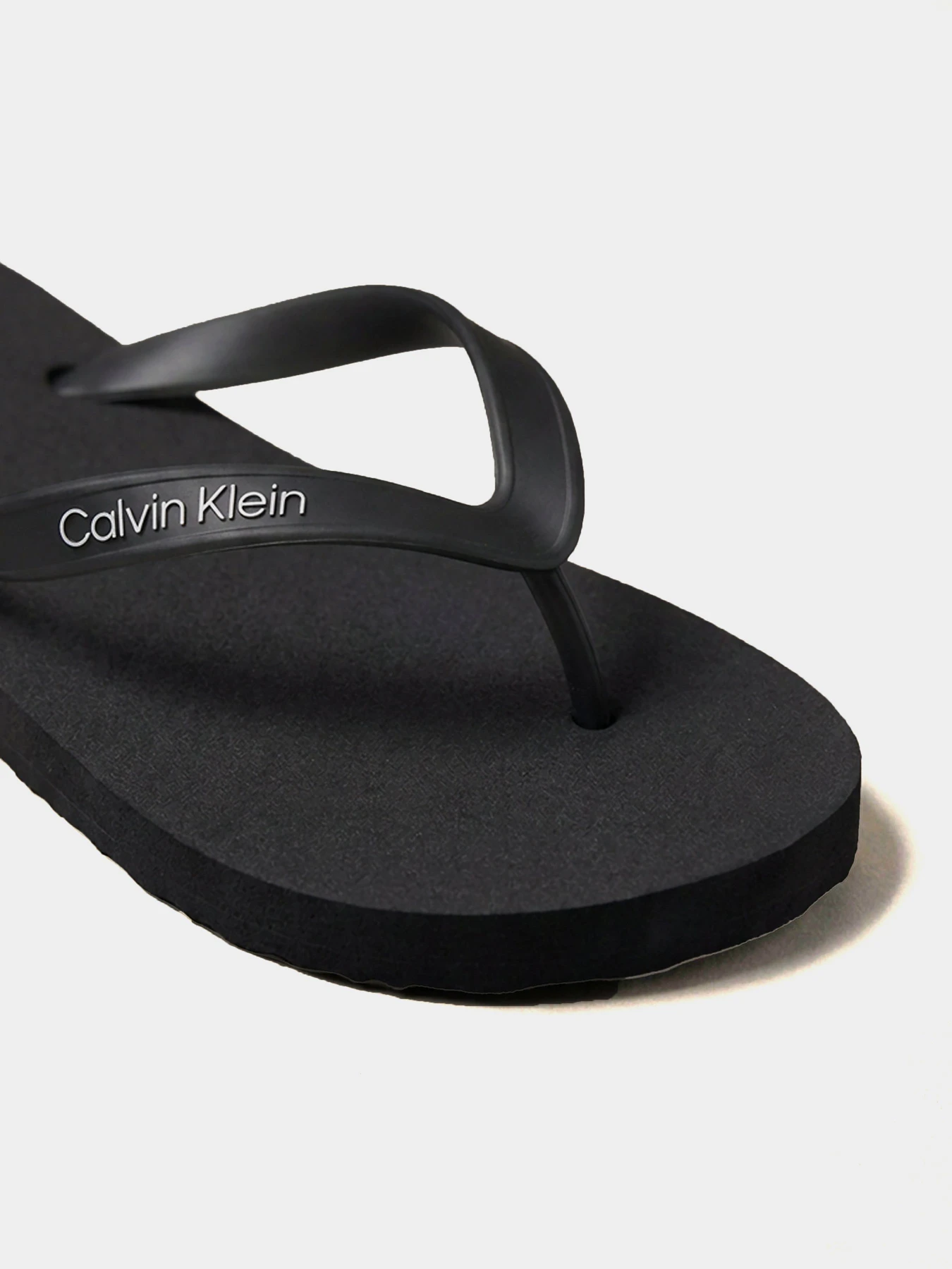 Шльопанці Calvin Klein BEACH THONG SLIDE модель HM0HM02105-0GJ Фото