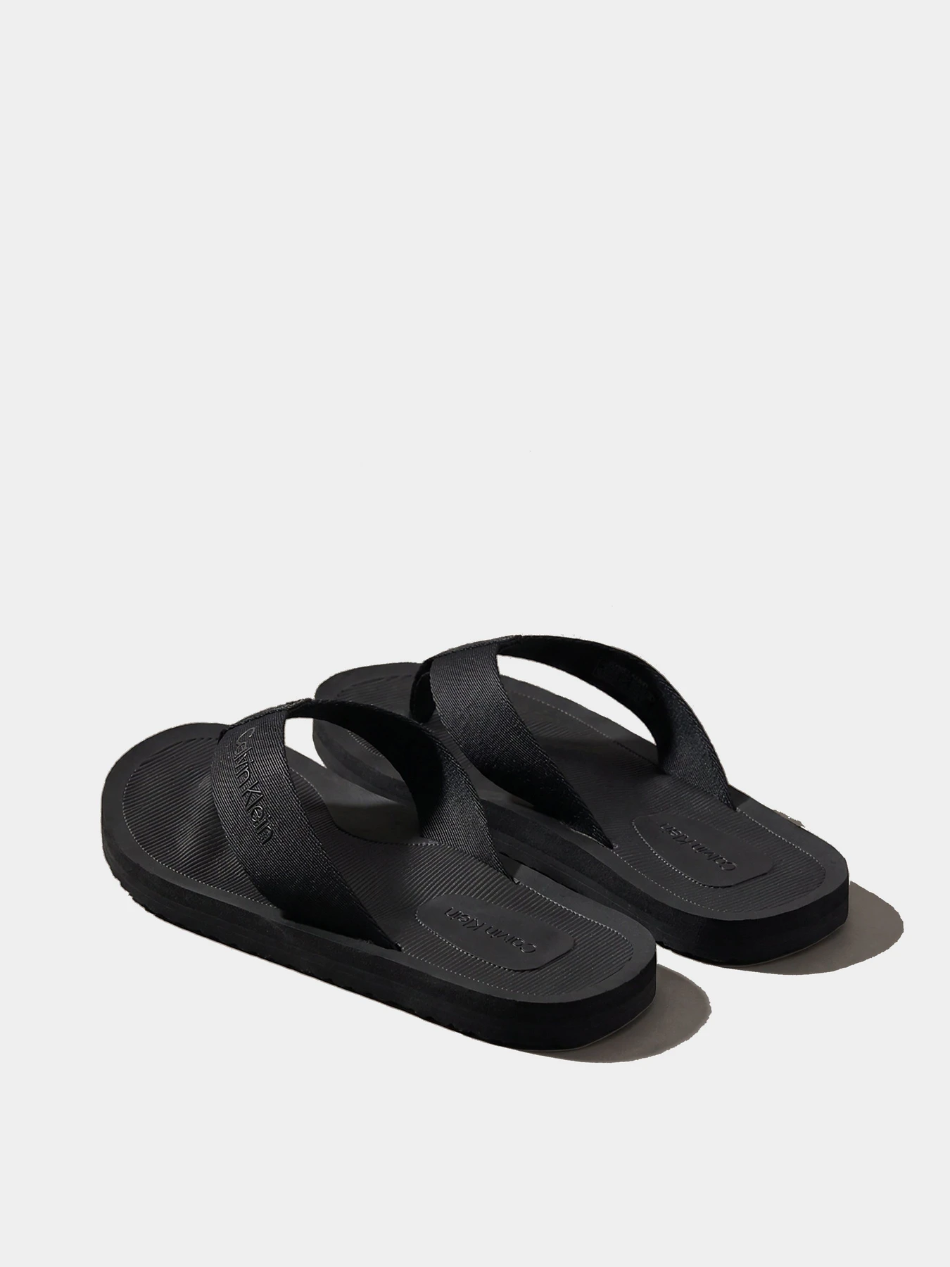 Шльопанці Calvin Klein CITY THONG SLIDE модель HM0HM02106-0GJ Шльопанці Calvin Klein CITY THONG SLIDE модель HM0HM02106-0GJ Фото