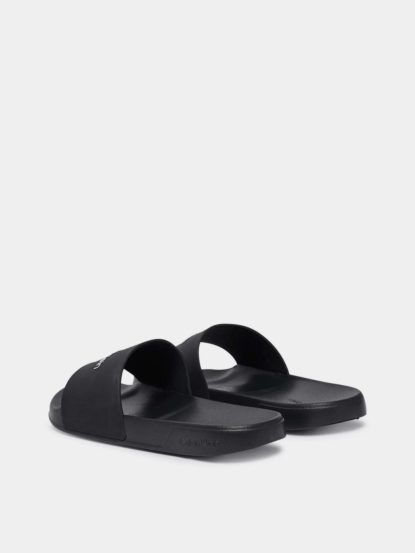 Шлёпанцы Calvin Klein ESS SLIDE MONOBRAND CV модель HM0HM02107-0GJ Шлёпанцы Calvin Klein ESS SLIDE MONOBRAND CV модель HM0HM02107-0GJ Фото