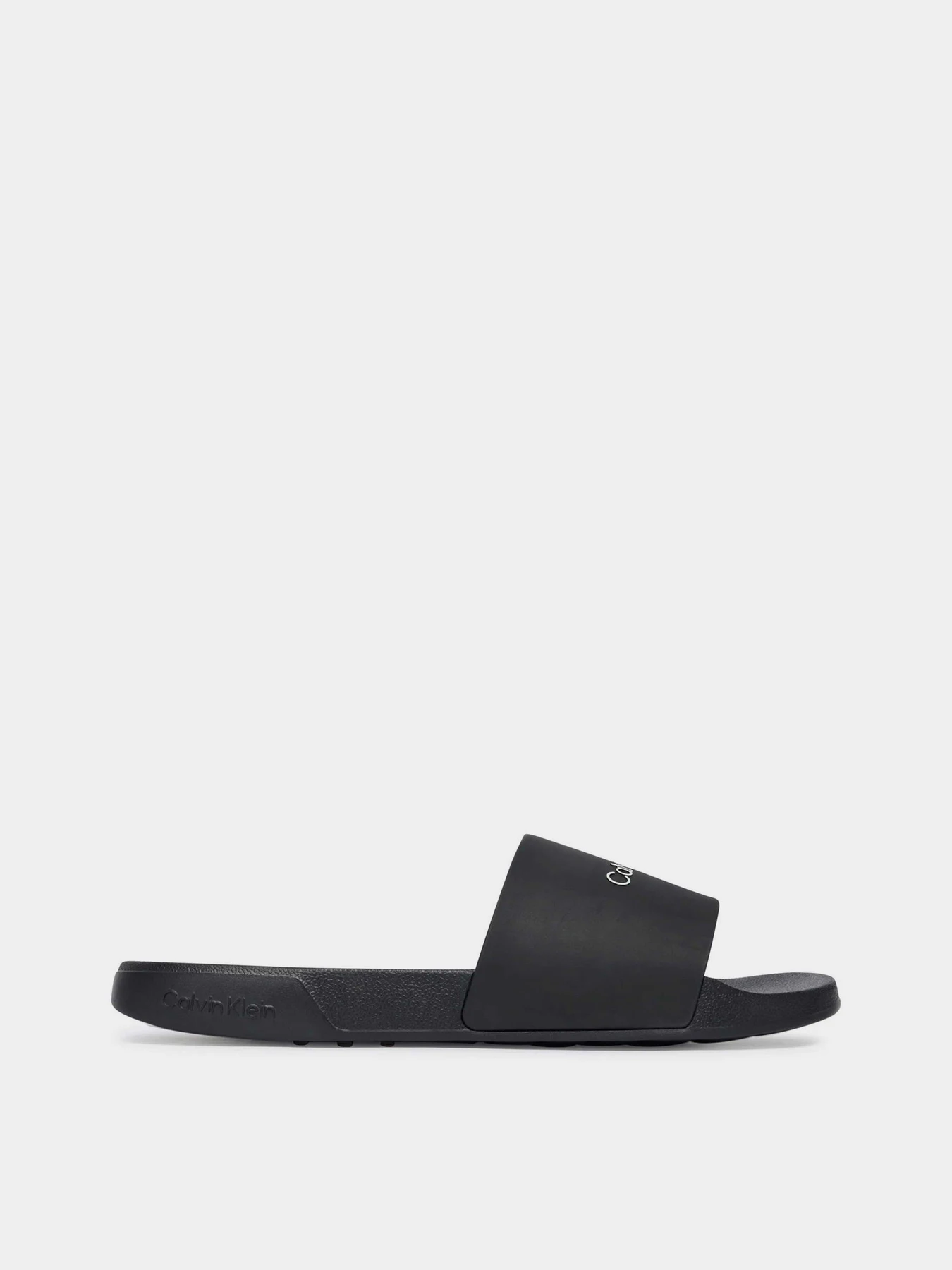 Шлёпанцы Calvin Klein ESS SLIDE MONOBRAND CV модель HM0HM02107-0GJ Шлёпанцы Calvin Klein ESS SLIDE MONOBRAND CV модель HM0HM02107-0GJ Фото