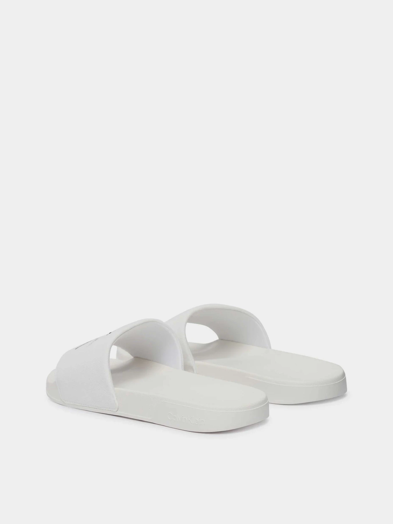 Шлёпанцы Calvin Klein ESS SLIDE CV модель YM0YM01393-0K4 Шлёпанцы Calvin Klein ESS SLIDE CV модель YM0YM01393-0K4 Фото