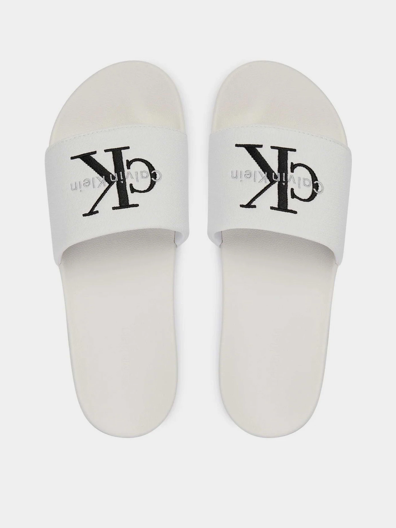 Шлёпанцы Calvin Klein ESS SLIDE CV модель YM0YM01393-0K4 Шлёпанцы Calvin Klein ESS SLIDE CV модель YM0YM01393-0K4 Фото