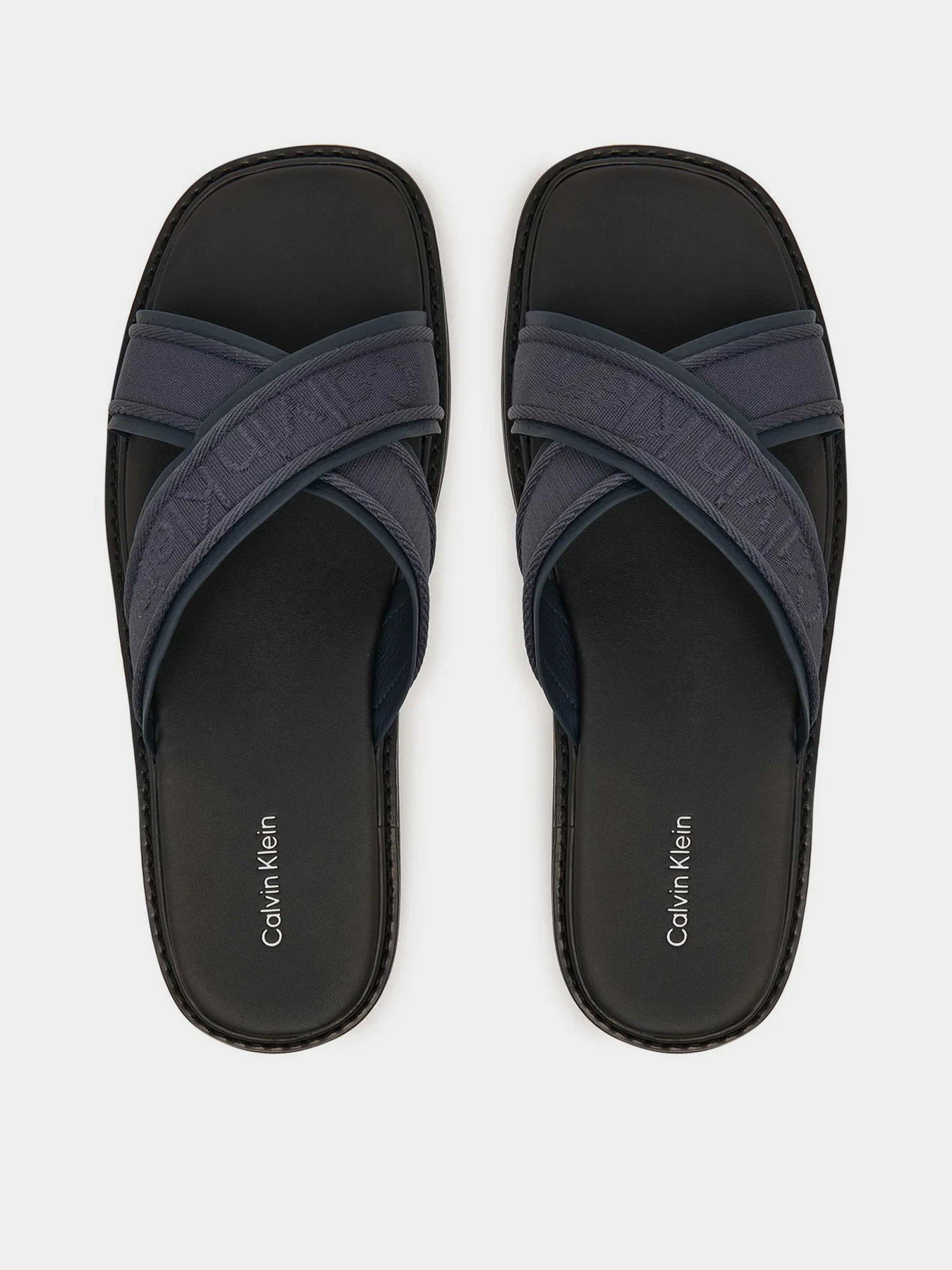 Шльопанці Calvin Klein SQ MOLDED SANDAL XCROSS WB модель HM0HM02101-0ZS Шльопанці Calvin Klein SQ MOLDED SANDAL XCROSS WB модель HM0HM02101-0ZS Фото