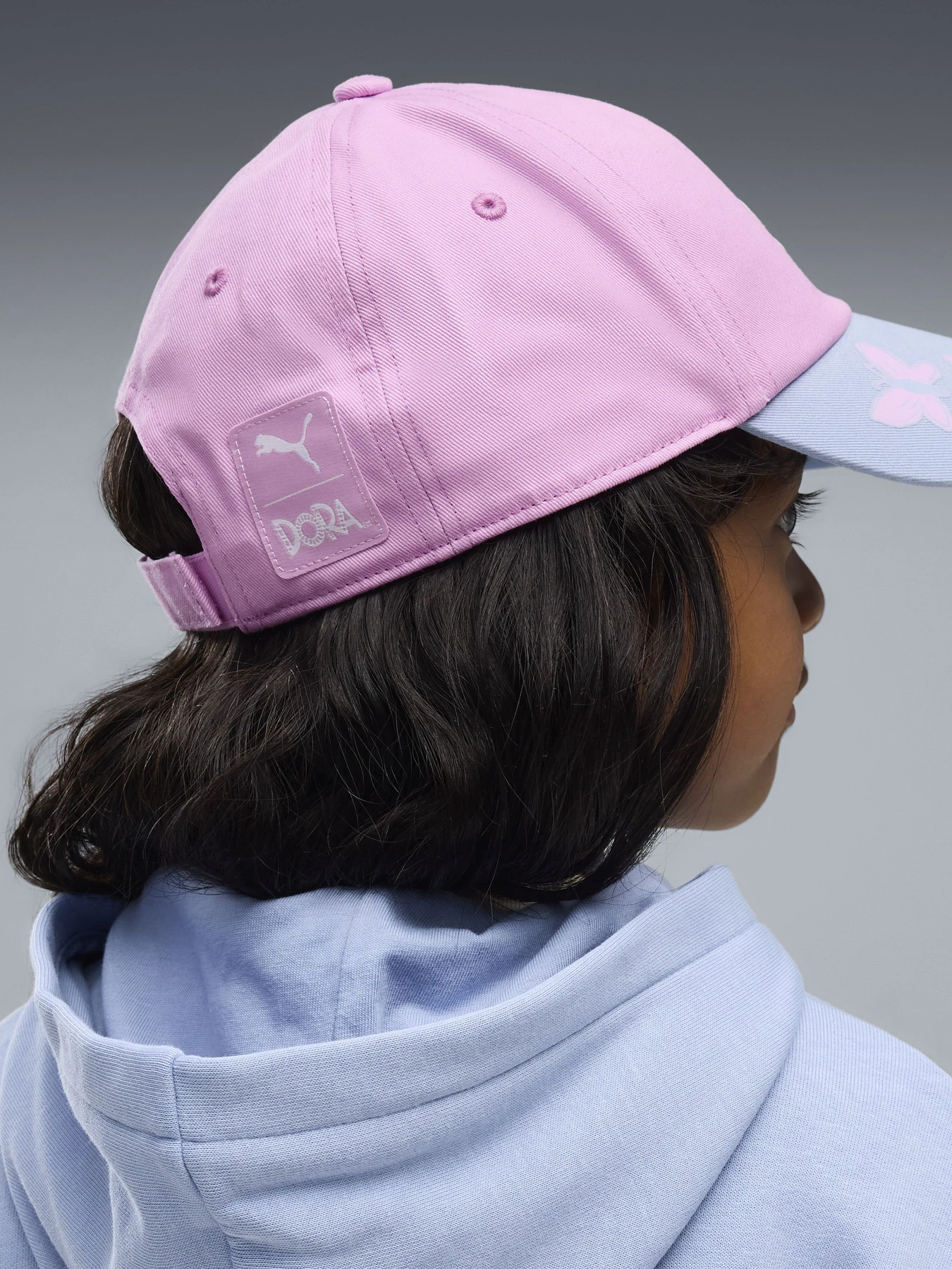 Шапки та кепки PUMA PUMA X DORA THE EXPLORER модель 02737401 Шапки та кепки PUMA PUMA X DORA THE EXPLORER модель 02737401 Фото