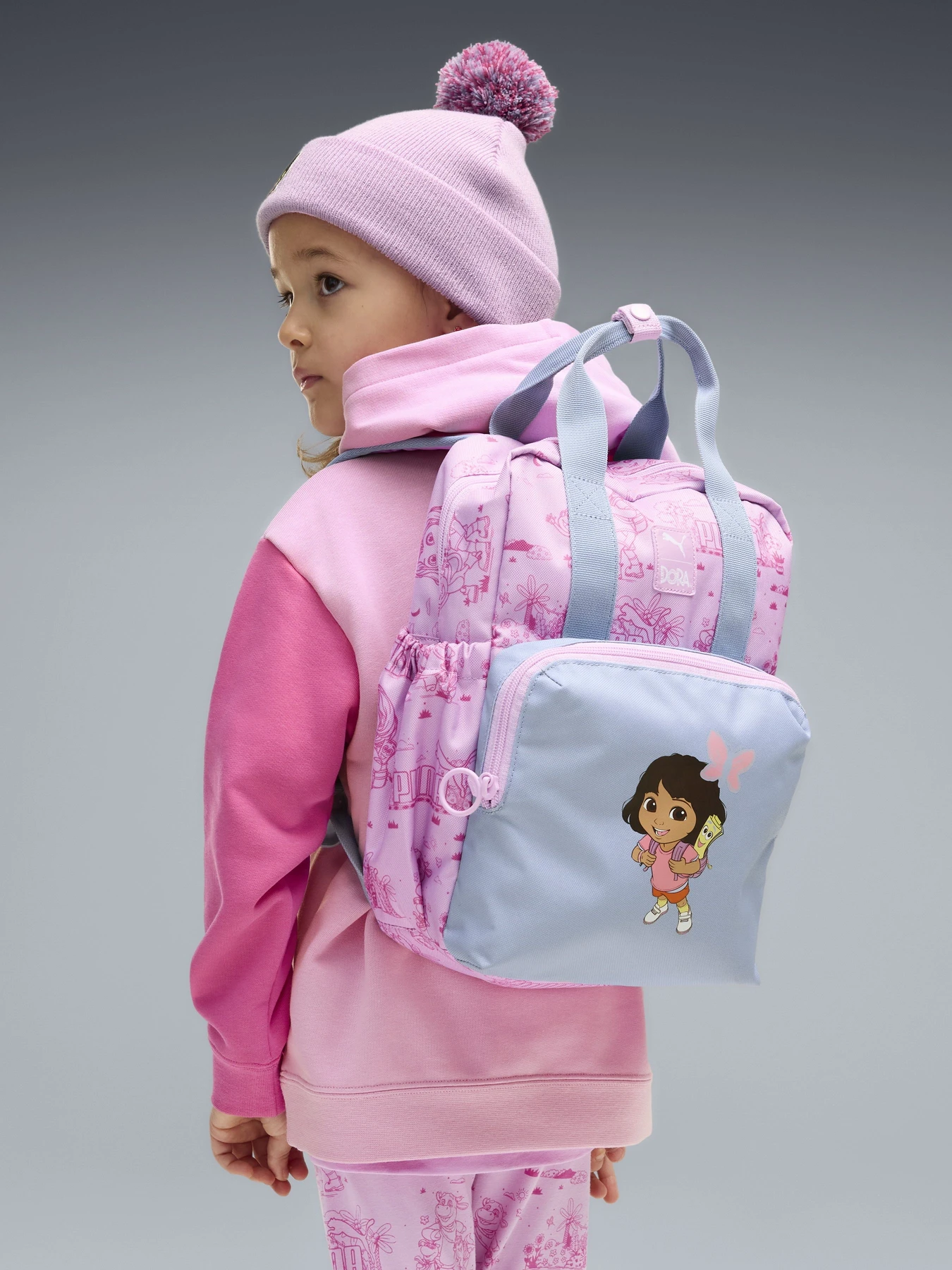 Рюкзаки PUMA PUMA X DORA THE EXPLORER 9L модель 09278701 Рюкзаки PUMA PUMA X DORA THE EXPLORER 9L модель 09278701 Фото