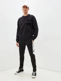 Брюки Calvin Klein Jeans модель J30J318590_BEH Фото