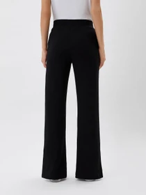 Брюки Calvin Klein Jeans Repeat Logo Jog Pant модель J20J217933_BEH Фото