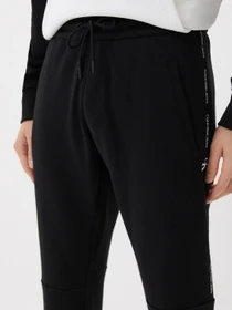 Брюки Calvin Klein Jeans модель J30J319652_BEH Фото