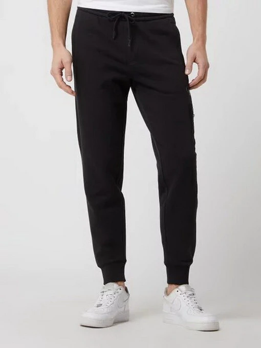 Брюки Calvin Klein Jeans модель J30J319775_BEH Фото