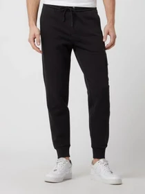 Брюки Calvin Klein Jeans модель J30J319775_BEH Фото