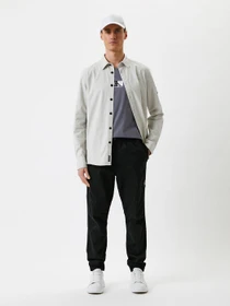Штани Calvin Klein Jeans модель J30J319656_BEH Фото