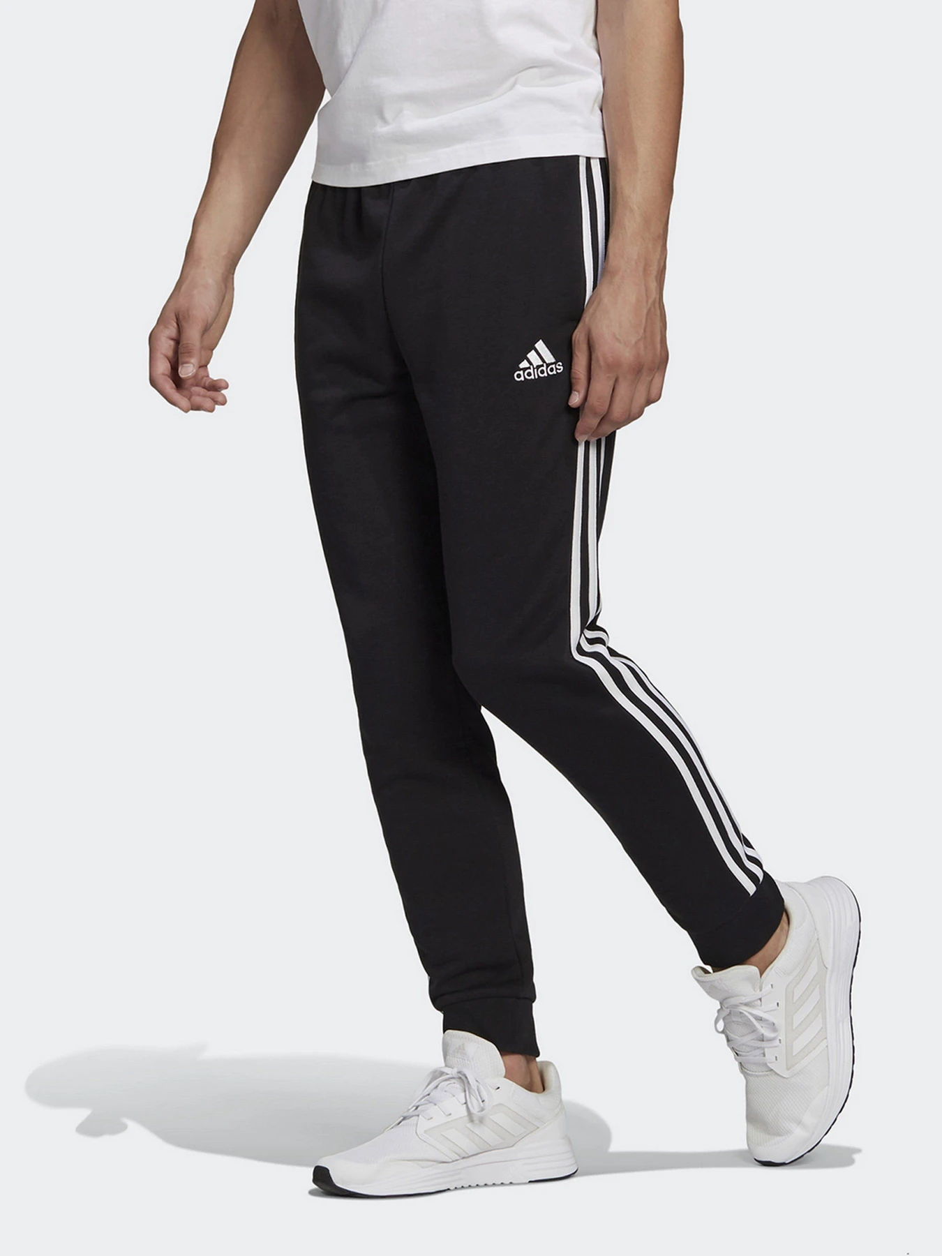 Брюки Adidas Essentials Cuff 3-Stripes модель GK8831 Брюки Adidas Essentials Cuff 3-Stripes модель GK8831 Фото
