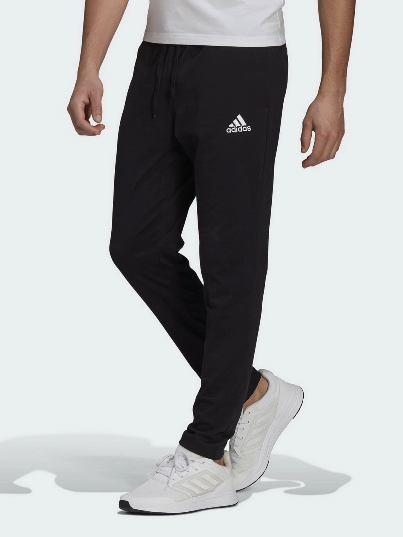 Брюки Adidas Essentials Tapered модель GK9222 Брюки Adidas Essentials Tapered модель GK9222 Фото
