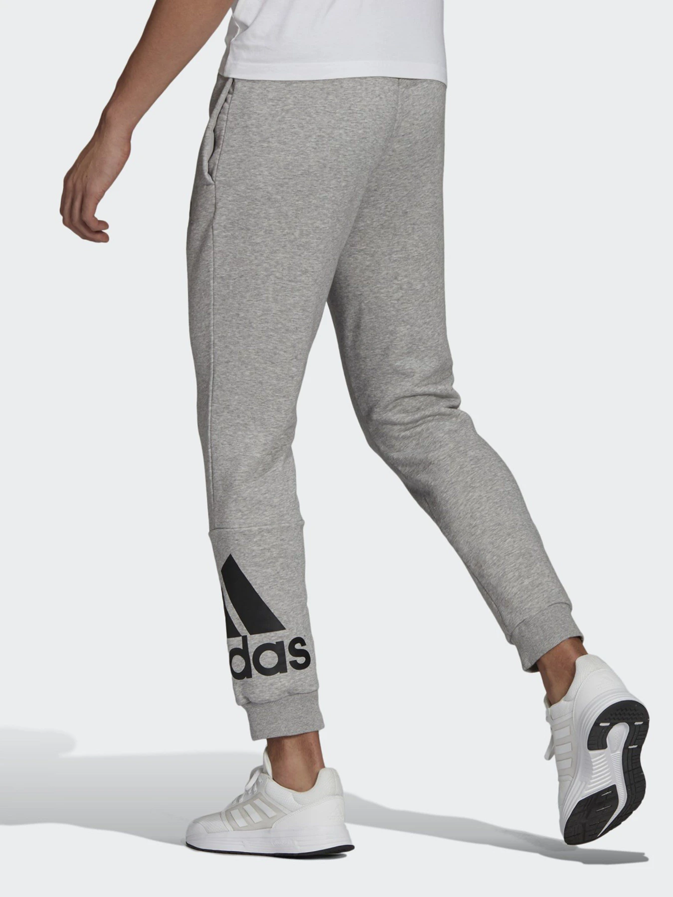 Брюки Adidas ESSENTIALS FLEECE TAPERED CUFF LOGO модель GK8969 Фото