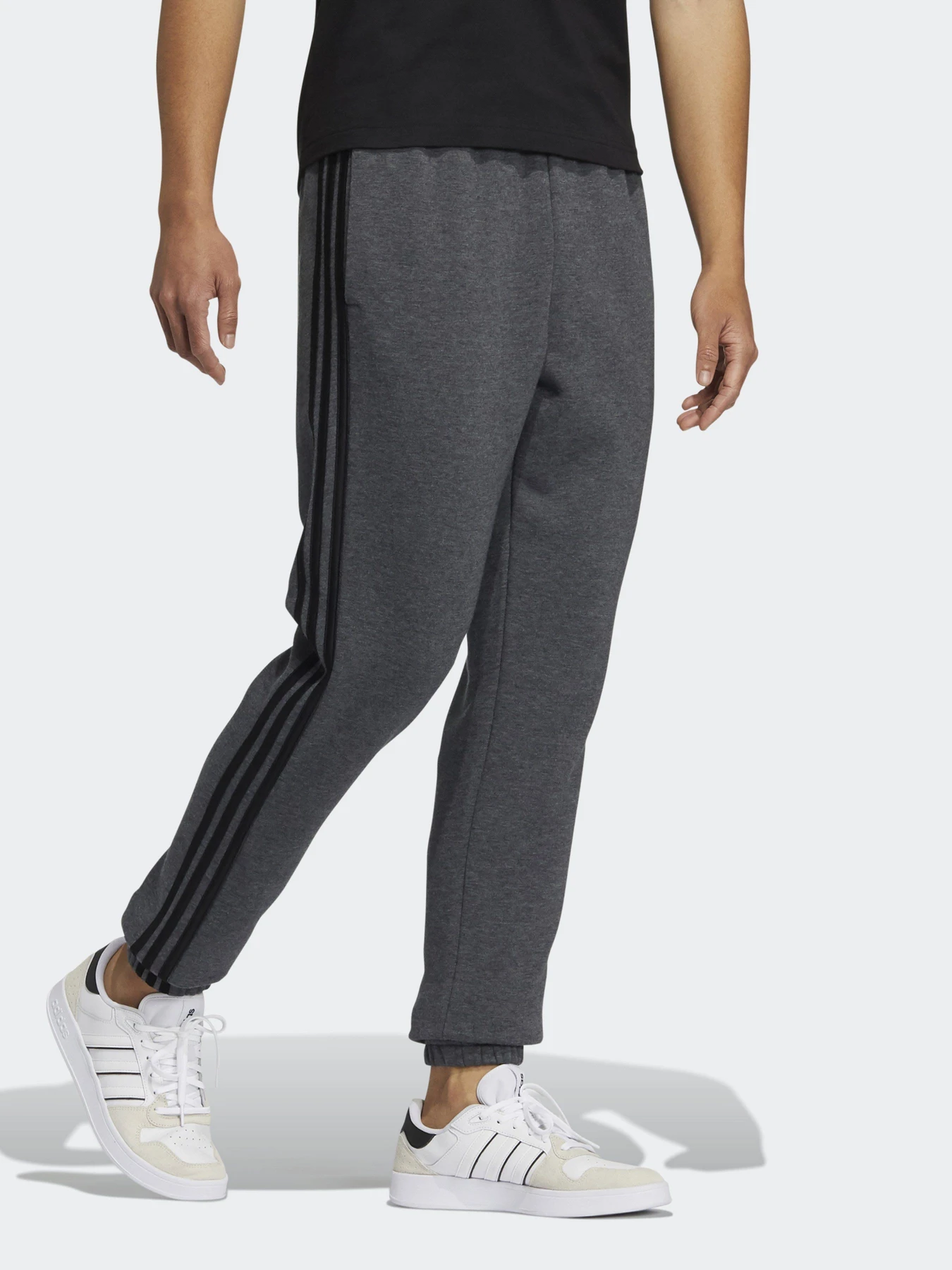 Брюки Adidas ESSENTIALS FLEECE TAPERED ELASTIC CUFF 3-STRIPES модель GK8891 Фото