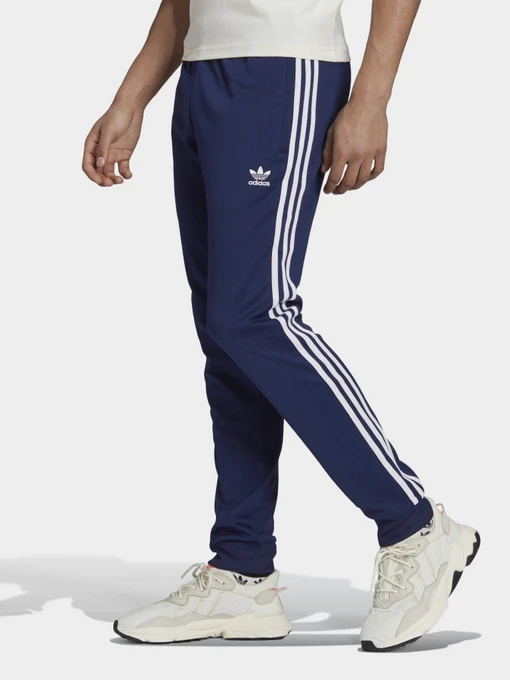 Брюки Adidas Adicolor Classics Primeblue Sst модель H06714 Фото