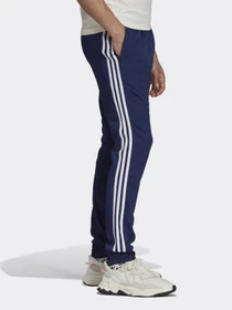 Брюки Adidas Adicolor Classics Primeblue Sst модель H06714 Фото