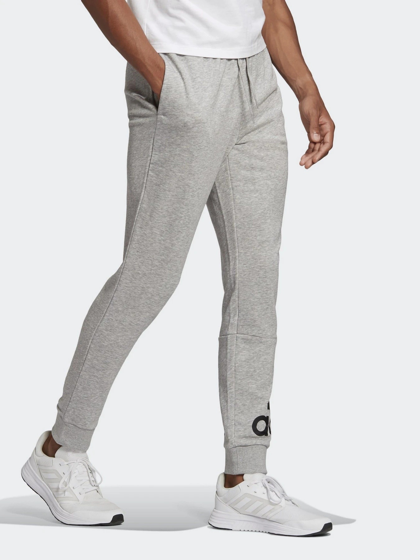 Брюки Adidas ESSENTIALS CUFF LOGO модель GK8978 Фото