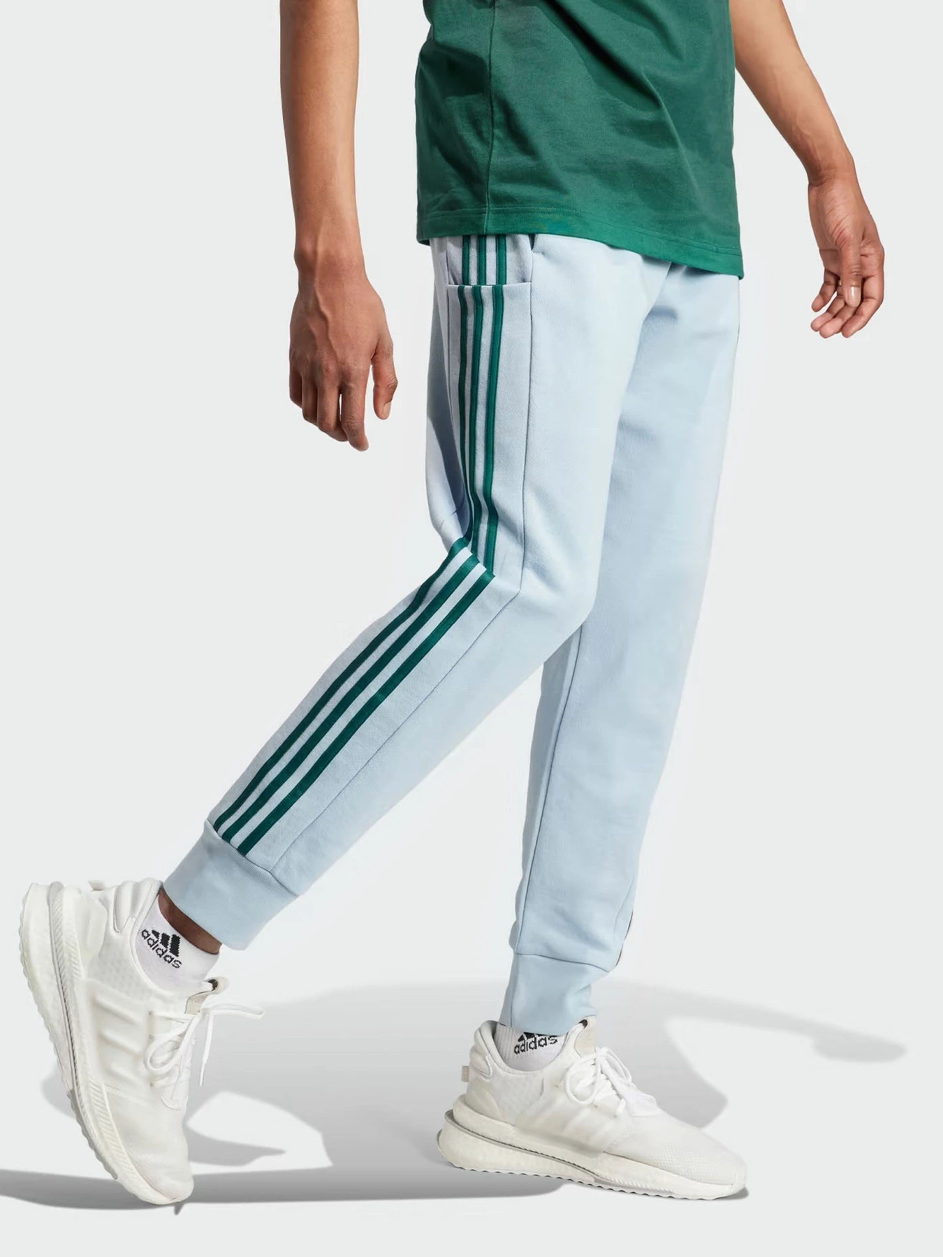 Брюки Adidas Essentials French Terry Tapered Cuff 3-Stripes модель IJ8700 Брюки Adidas Essentials French Terry Tapered Cuff 3-Stripes модель IJ8700 Фото