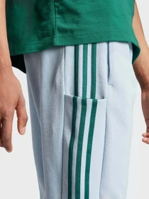 Брюки Adidas Essentials French Terry Tapered Cuff 3-Stripes модель IJ8700 Фото