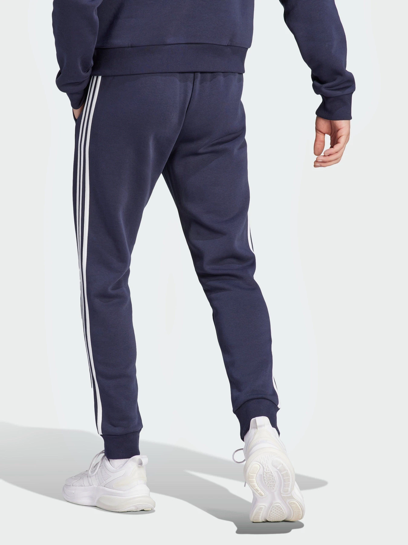 Брюки Adidas Essentials Fleece 3-Stripes Tapered Cuff модель IJ6493 Брюки Adidas Essentials Fleece 3-Stripes Tapered Cuff модель IJ6493 Фото