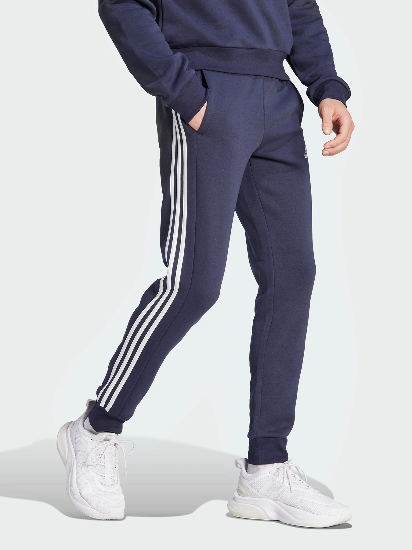 Брюки Adidas Essentials Fleece 3-Stripes Tapered Cuff модель IJ6493 Брюки Adidas Essentials Fleece 3-Stripes Tapered Cuff модель IJ6493 Фото