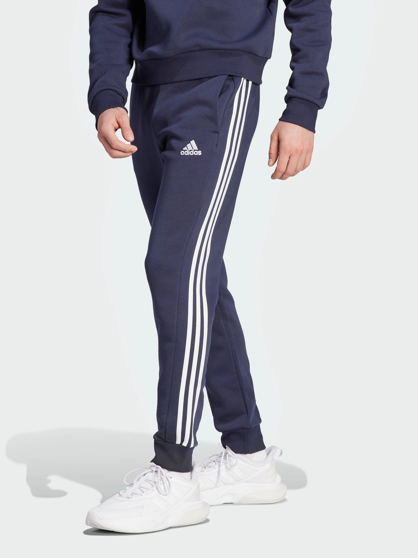 Брюки Adidas Essentials Fleece 3-Stripes Tapered Cuff модель IJ6493 Брюки Adidas Essentials Fleece 3-Stripes Tapered Cuff модель IJ6493 Фото