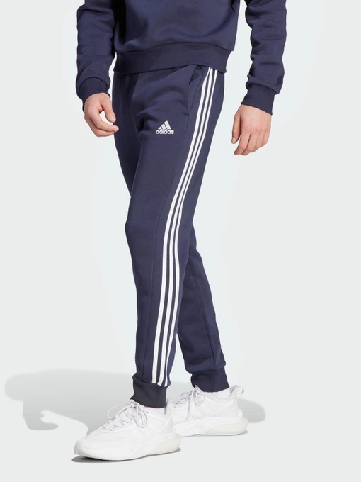 Брюки Adidas Essentials Fleece 3-Stripes Tapered Cuff модель IJ6493 Фото
