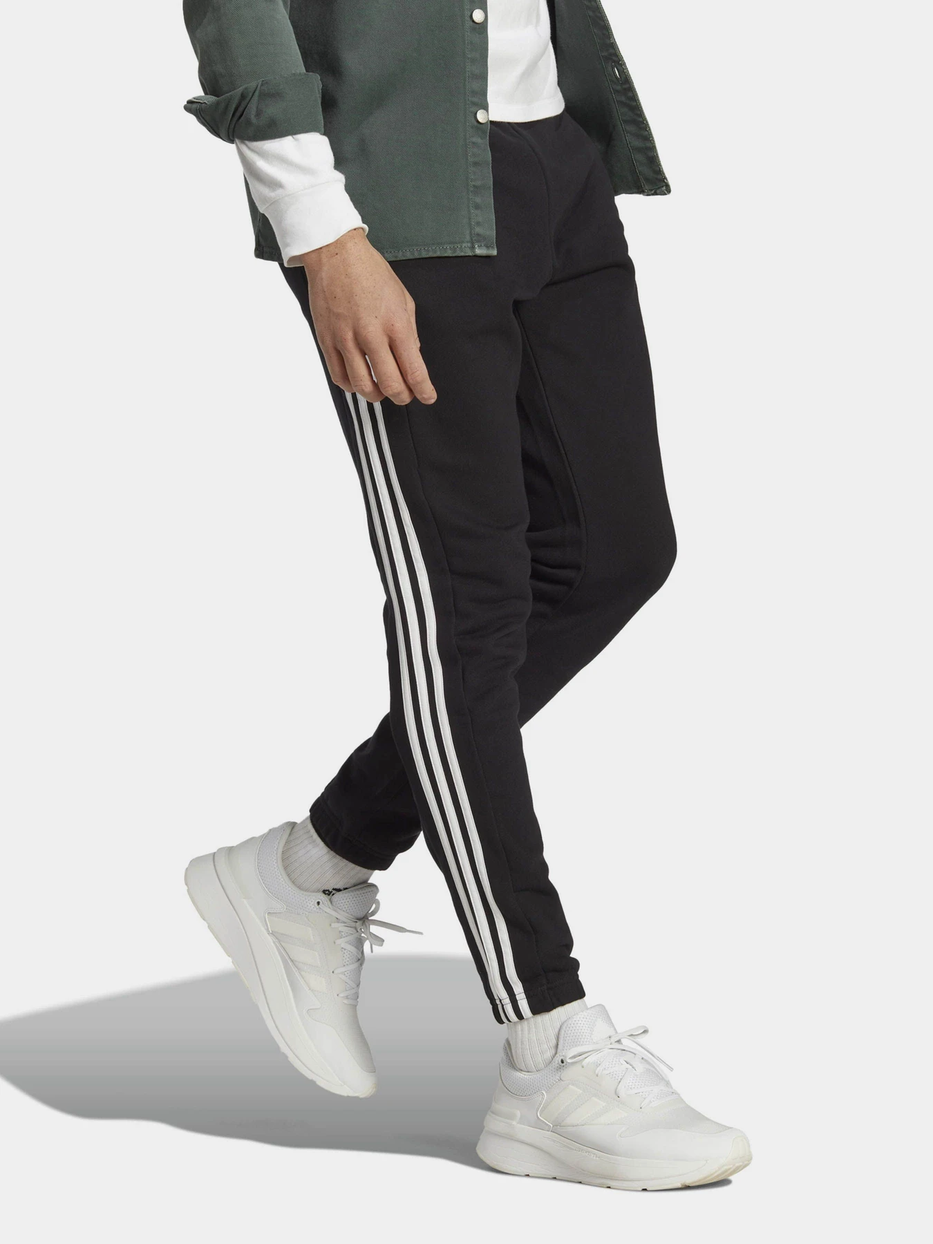 Брюки Adidas ESSENTIALS FRENCH TERRY TAPERE модель IC0050 Брюки Adidas ESSENTIALS FRENCH TERRY TAPERE модель IC0050 Фото