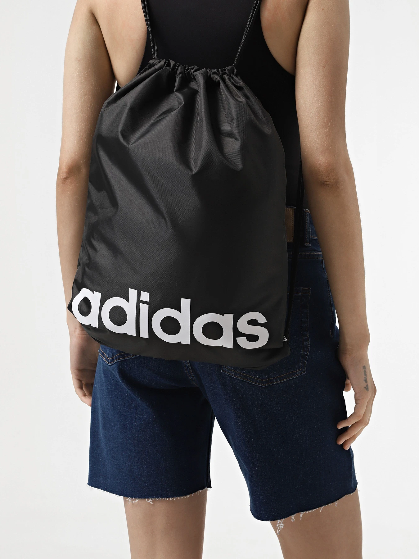 Рюкзаки Adidas LINEAR GYMSACK 16L модель HT4740 Фото