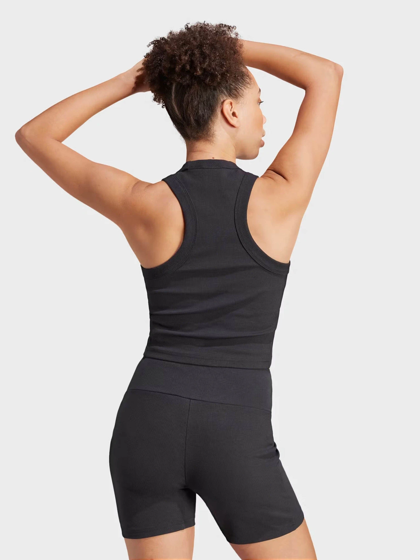 Футболки и поло Adidas LOUNGE RIBBED CROP TANK модель IR8785 Футболки и поло Adidas LOUNGE RIBBED CROP TANK модель IR8785 Фото