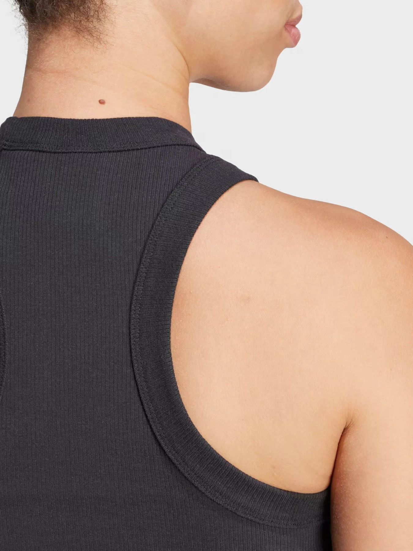 Футболки и поло Adidas LOUNGE RIBBED CROP TANK модель IR8785 Футболки и поло Adidas LOUNGE RIBBED CROP TANK модель IR8785 Фото