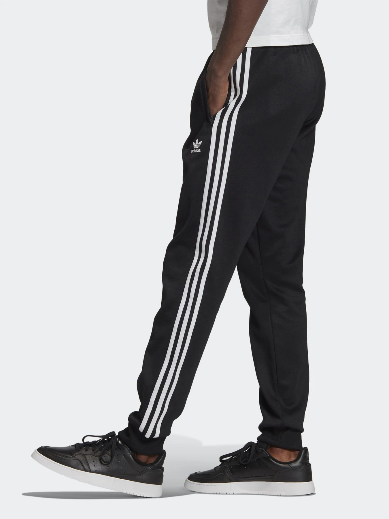 Брюки Adidas Adicolor Classics Primeblue Sst модель GF0210 Брюки Adidas Adicolor Classics Primeblue Sst модель GF0210 Фото