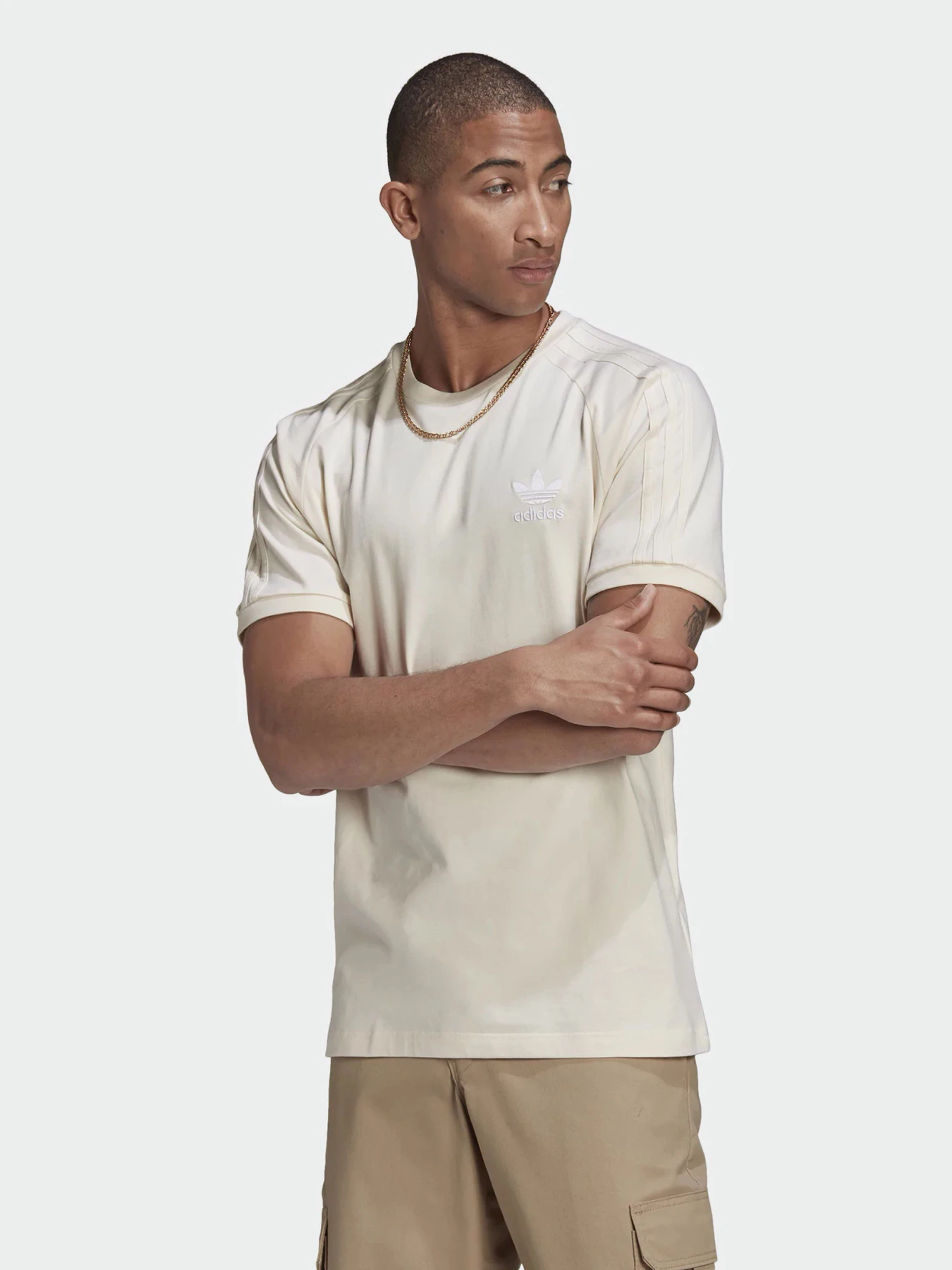 Футболки і поло Adidas ADICOLOR 3-STRIPES NO-DYE модель GN4187 Футболки і поло Adidas ADICOLOR 3-STRIPES NO-DYE модель GN4187 Фото