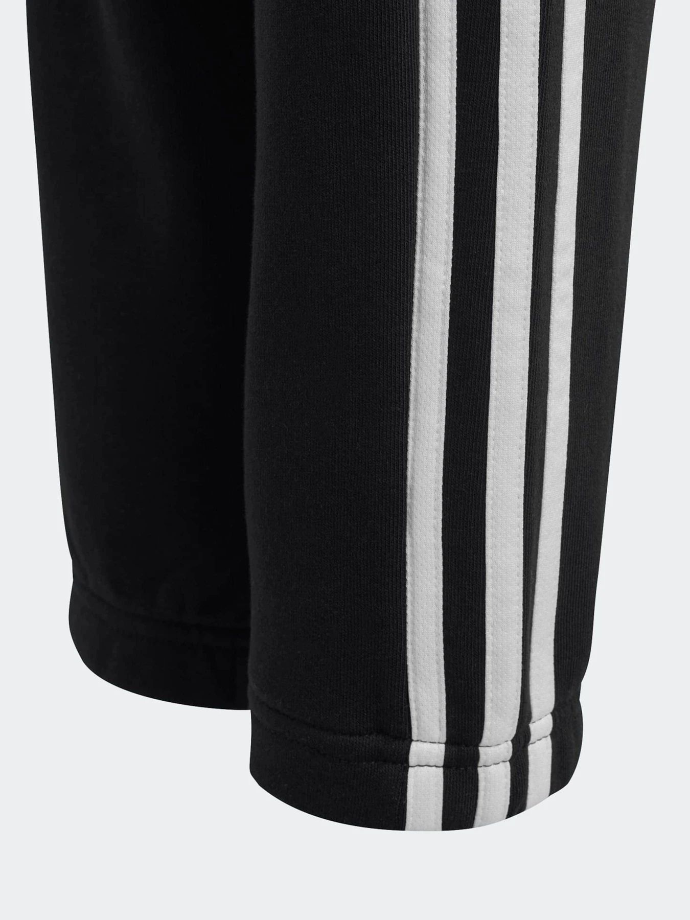 Брюки Adidas ESSENTIALS 3-STRIPES FLEECE модель HR6333 Брюки Adidas ESSENTIALS 3-STRIPES FLEECE модель HR6333 Фото