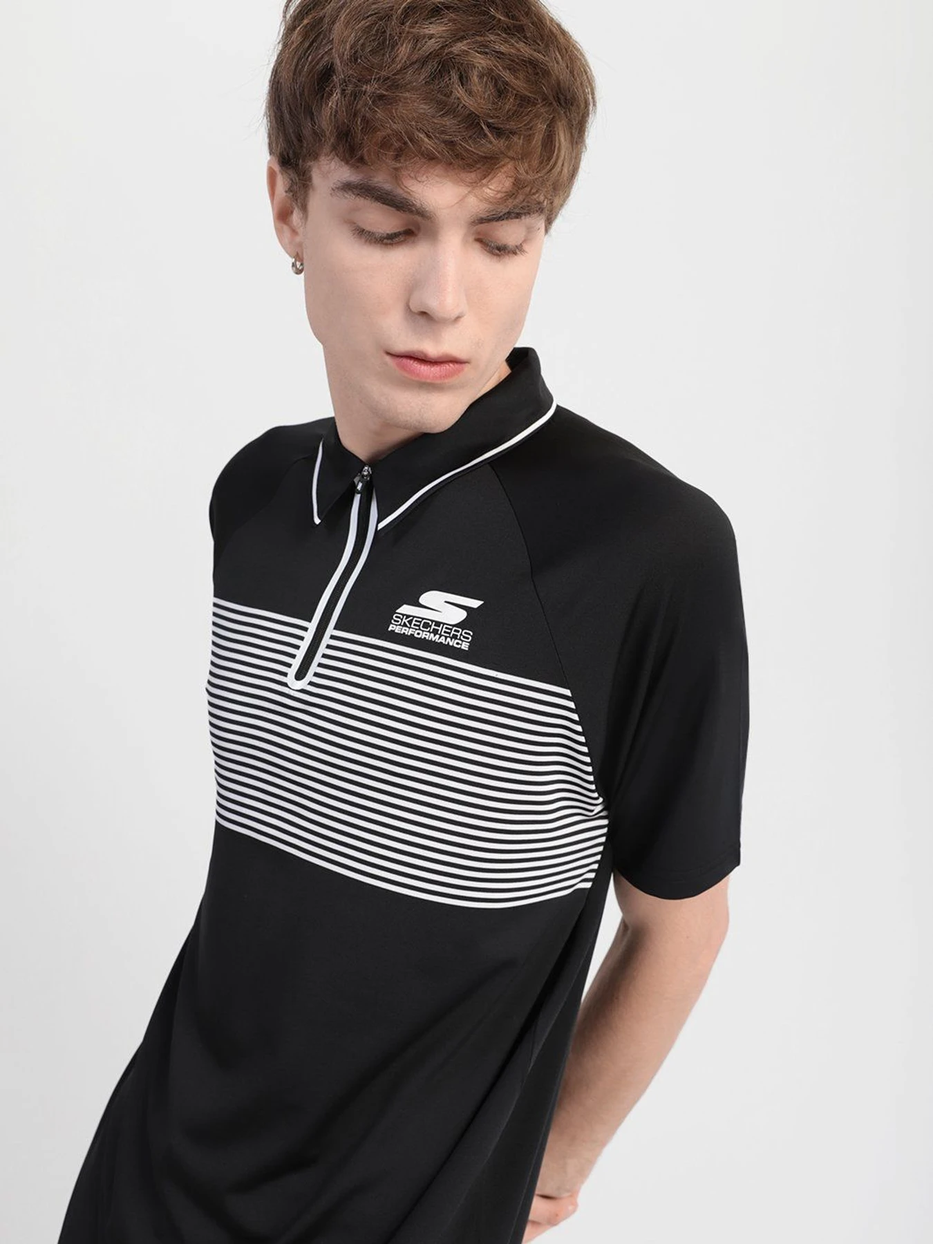 Футболки и поло Skechers Fade Stripe Golf Wіcking Breathable Zip Soft Feel модель M01TO36 BLK Футболки и поло Skechers Fade Stripe Golf Wіcking Breathable Zip Soft Feel модель M01TO36 BLK Фото