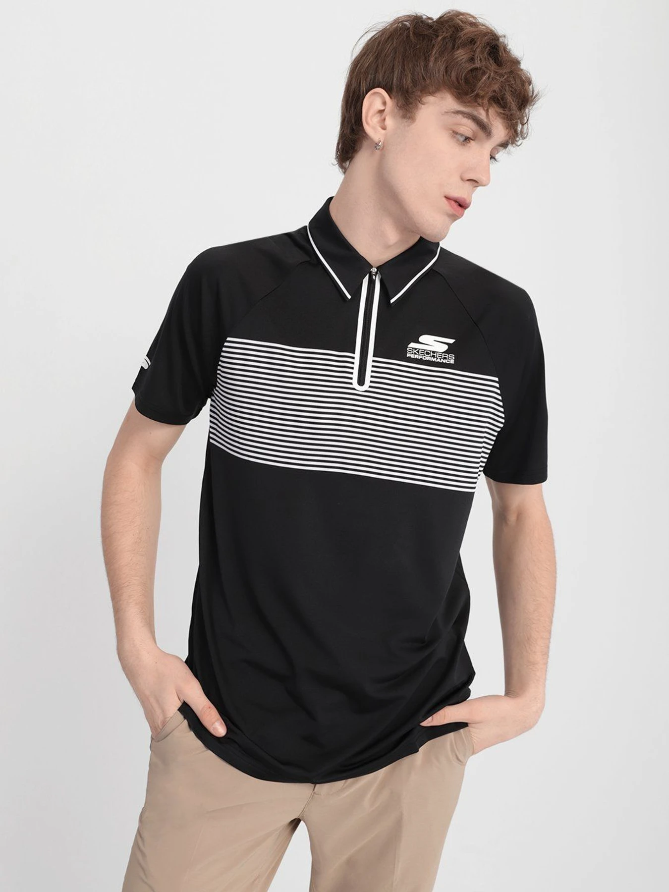 Футболки и поло Skechers Fade Stripe Golf Wіcking Breathable Zip Soft Feel модель M01TO36 BLK Футболки и поло Skechers Fade Stripe Golf Wіcking Breathable Zip Soft Feel модель M01TO36 BLK Фото