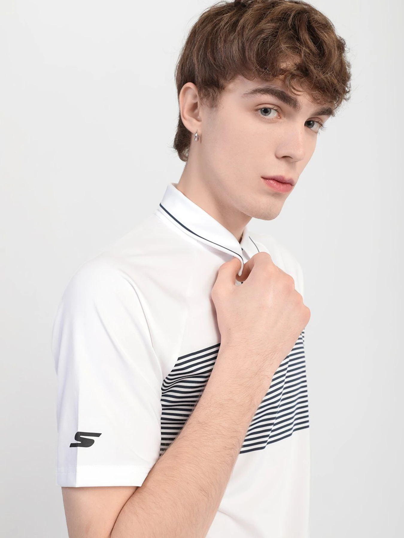 Футболки и поло Skechers Fade Stripe Golf Wіcking Breathable Zip Soft Feel модель M01TO36 WHT Футболки и поло Skechers Fade Stripe Golf Wіcking Breathable Zip Soft Feel модель M01TO36 WHT Фото