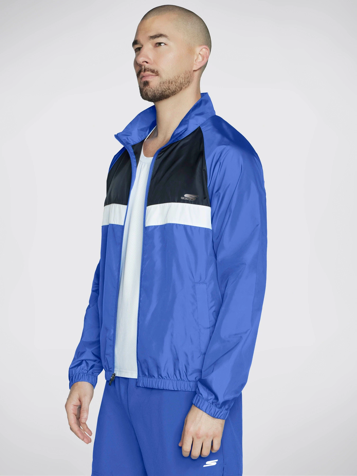 Худи и свитшоты Skechers Speed Elite Track Jacket модель JA64 BLGR Худи и свитшоты Skechers Speed Elite Track Jacket модель JA64 BLGR Фото