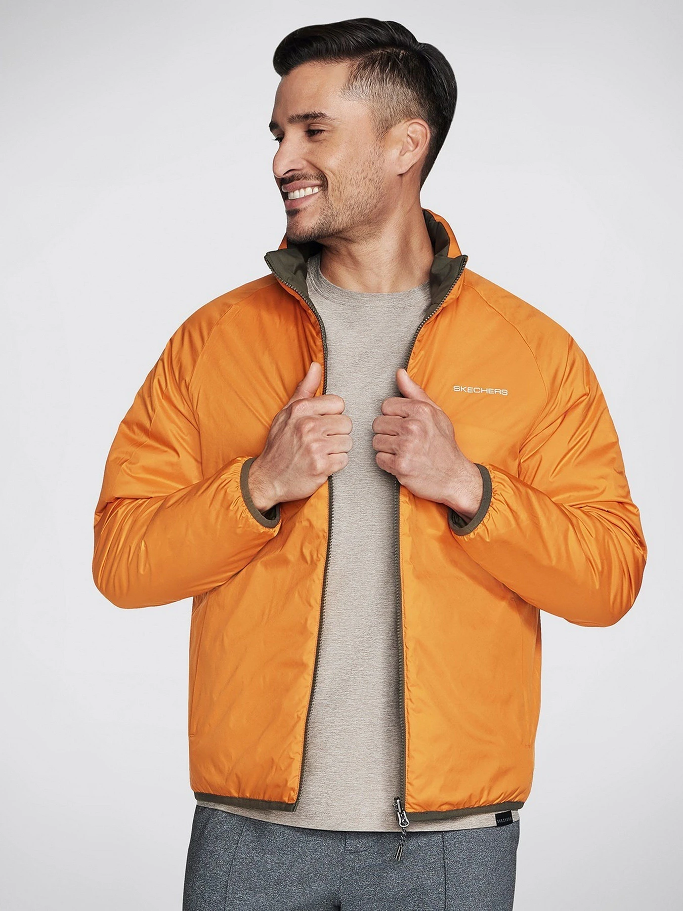 Куртки та дублянки Skechers GO Shield Altitude Reversible модель JA139 BROL Куртки та дублянки Skechers GO Shield Altitude Reversible модель JA139 BROL Фото
