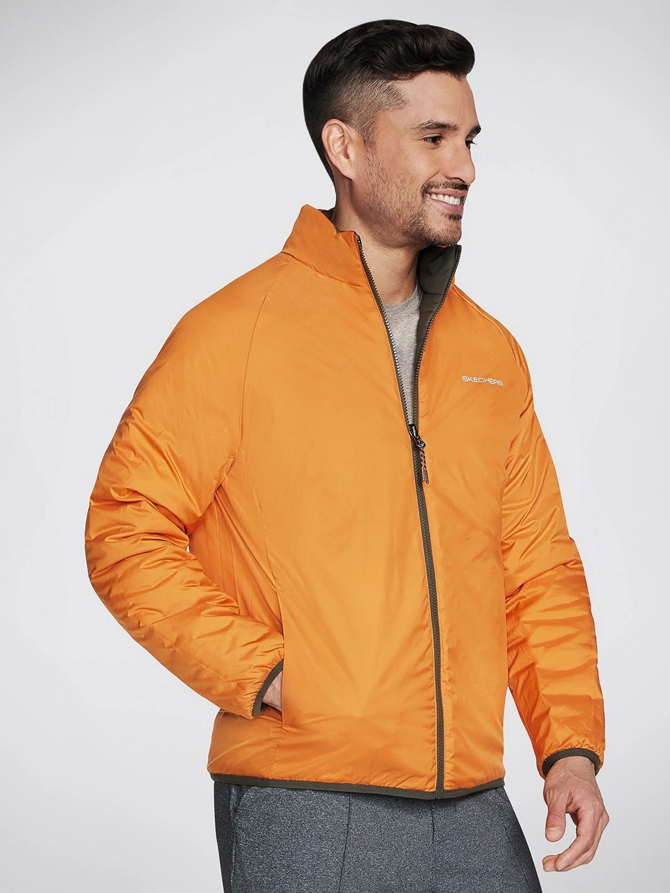 Куртки та дублянки Skechers GO Shield Altitude Reversible модель JA139 BROL Куртки та дублянки Skechers GO Shield Altitude Reversible модель JA139 BROL Фото