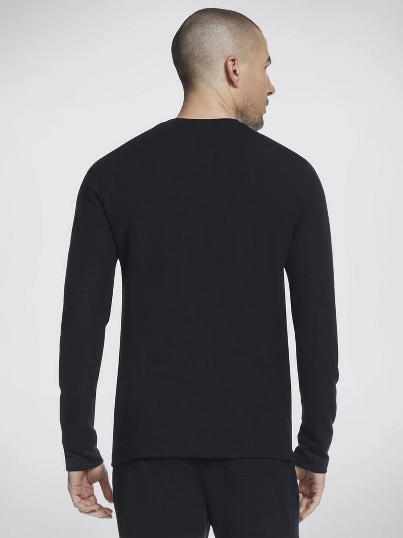 Худі та світшоти Skechers GO Knit Waffle Henley модель LT18 BLK Худі та світшоти Skechers GO Knit Waffle Henley модель LT18 BLK Фото
